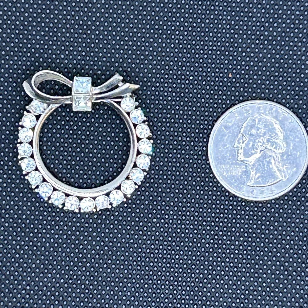 Elegant Silver Crystal Bow Pendant